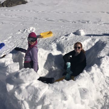 Scouts building igloos during the Annual Ski Trip
