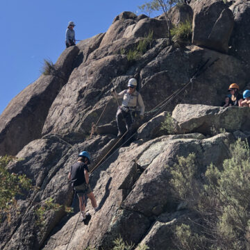 Cubs and Joeys learning to Abseil during the family Alpine Trip